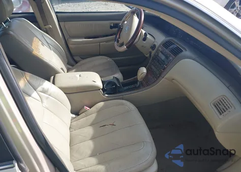 2003 Toyota Avalon Xls z USA, uszkodzony, nr VIN 4T1BF28B33U323234